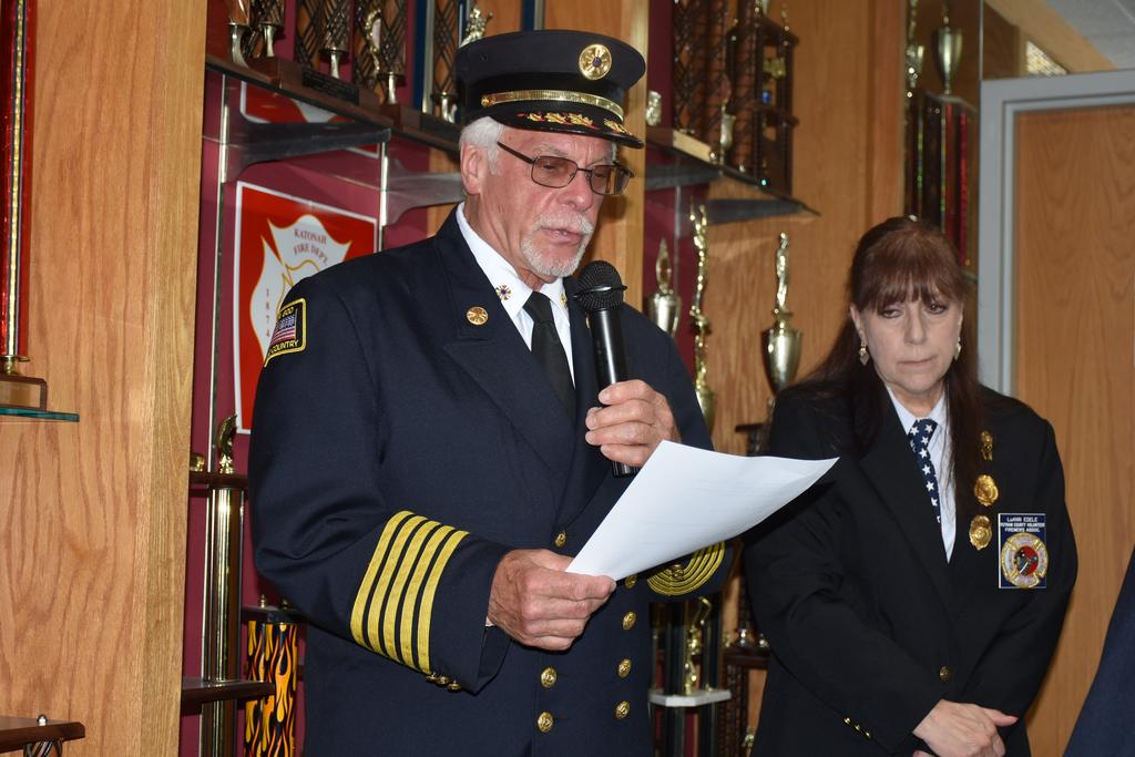 Chief Edward Butler handles his part of the necrology