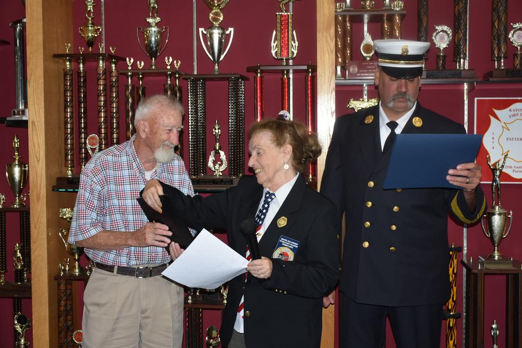 LCFD's Edward Hallisey receives his award from Marie Delawder for 50 yrs in PCVFA